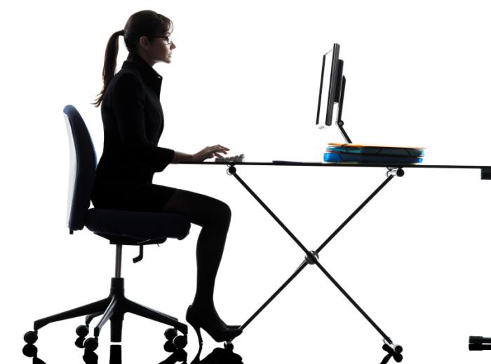 woman-sitting-at-her-desk.jpg